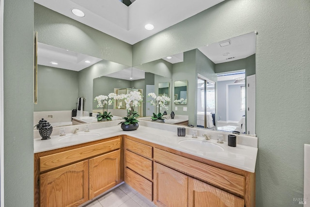 bathroom featuring tile patterned floors and vanity