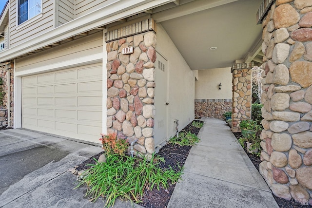 exterior space with a garage