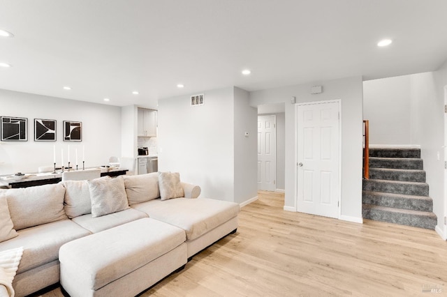 living room featuring light wood-type flooring