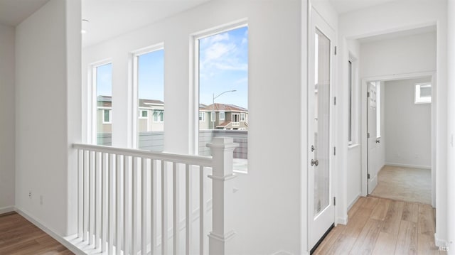 corridor featuring light hardwood / wood-style flooring