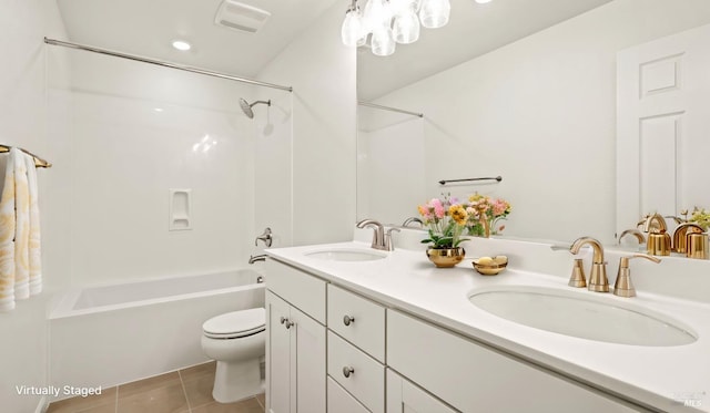 full bathroom featuring tile patterned flooring, vanity, shower / tub combination, and toilet