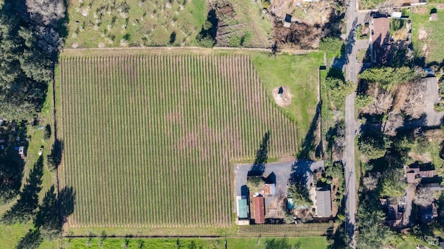 birds eye view of property featuring a rural view