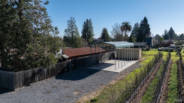 view of yard with a carport