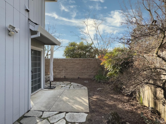 view of yard with a patio area and fence