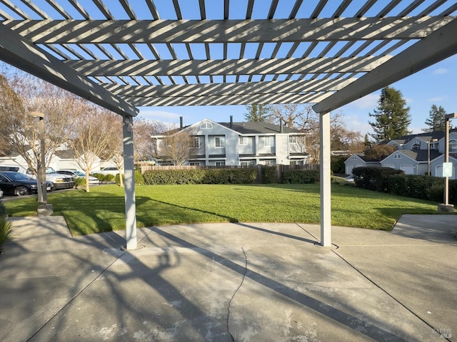 view of patio featuring a residential view and a pergola