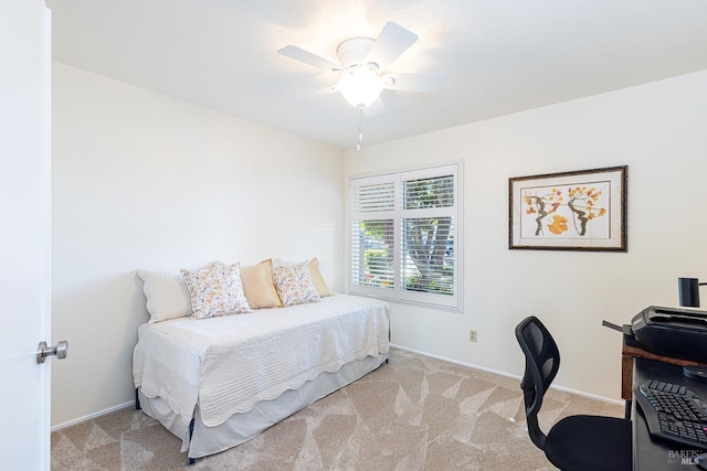 bedroom featuring ceiling fan, baseboards, and carpet flooring