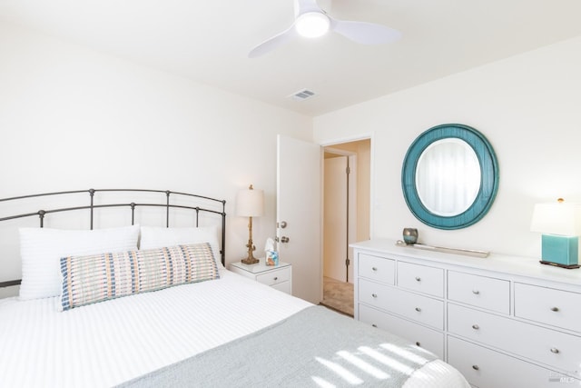 bedroom featuring visible vents and ceiling fan