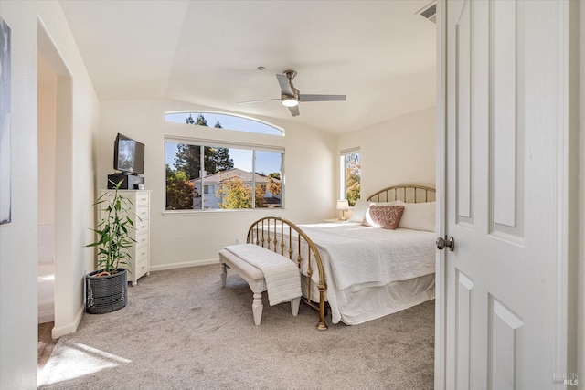 bedroom featuring lofted ceiling, carpet floors, and ceiling fan