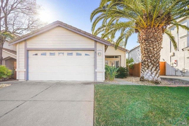 ranch-style home featuring a front yard