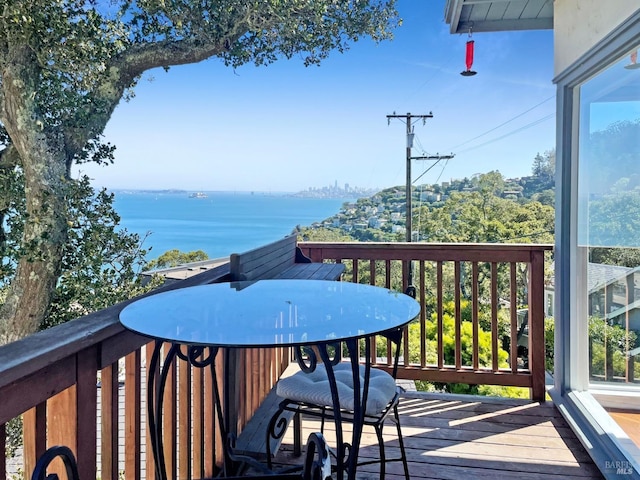 balcony featuring a water view