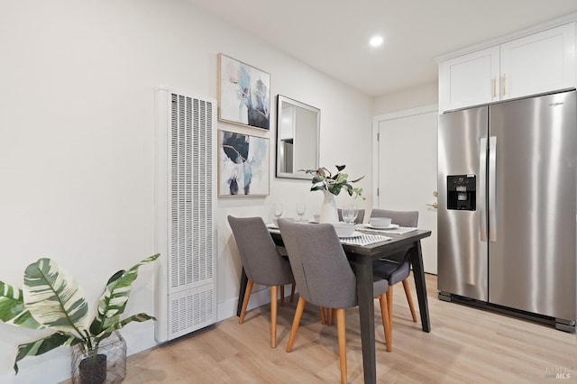 dining room featuring light wood-type flooring