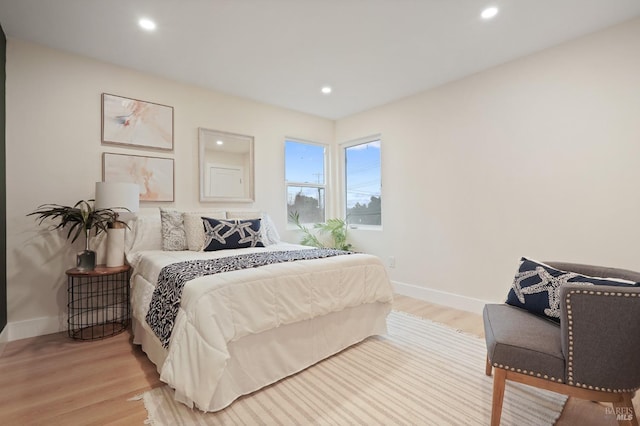 bedroom featuring light hardwood / wood-style flooring