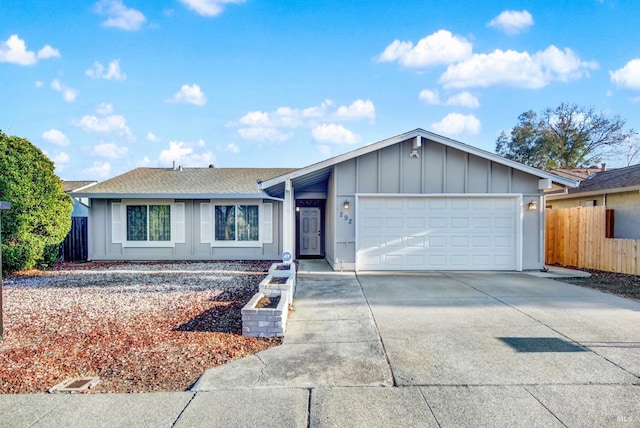 single story home featuring a garage