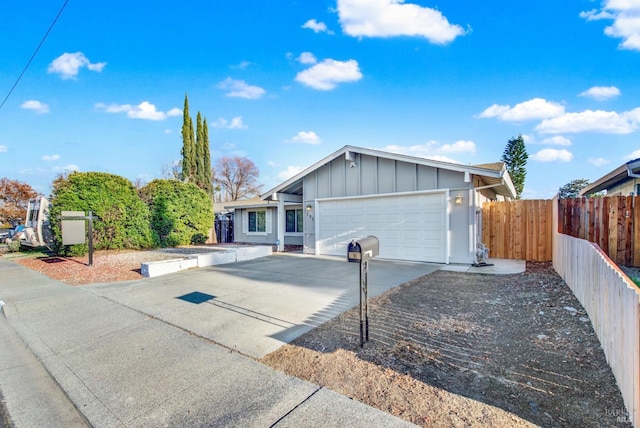 ranch-style home with a garage