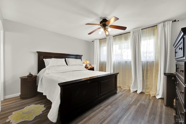 bedroom featuring ceiling fan and wood-type flooring