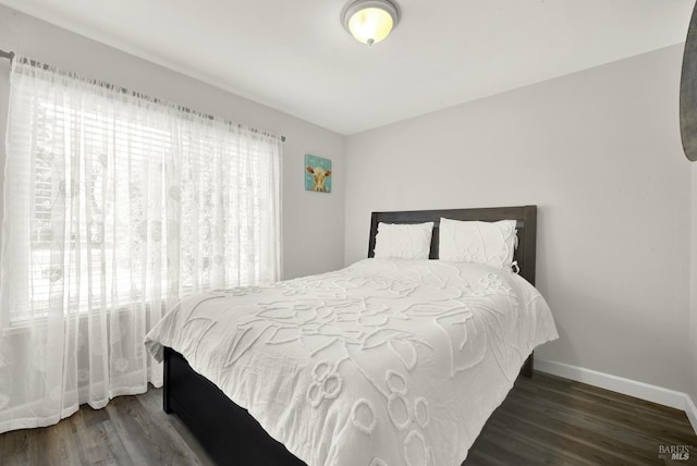 bedroom featuring dark hardwood / wood-style floors