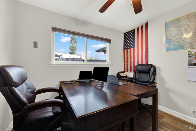 office area featuring wood-type flooring and ceiling fan