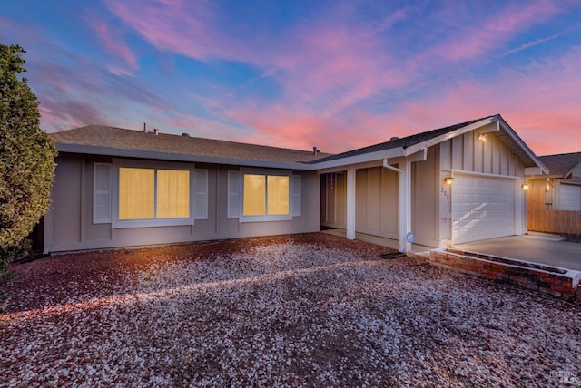 view of front of home with a garage