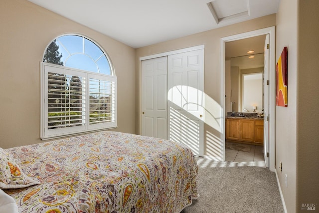 carpeted bedroom with a closet