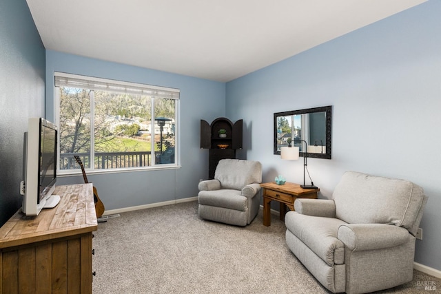 sitting room with light carpet