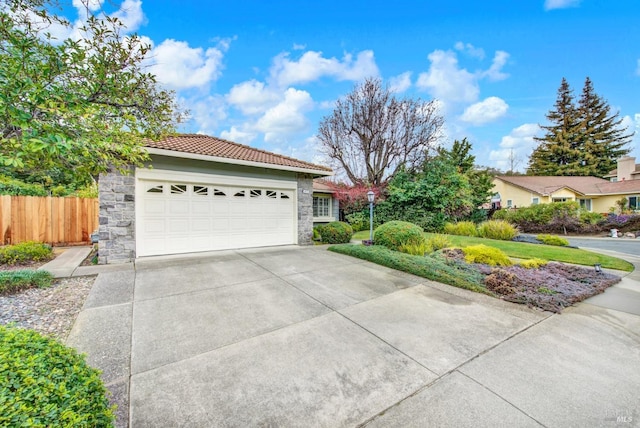 view of front of property featuring a garage