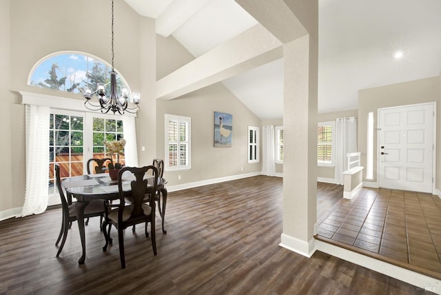 dining space with beamed ceiling, high vaulted ceiling, a chandelier, and dark hardwood / wood-style flooring