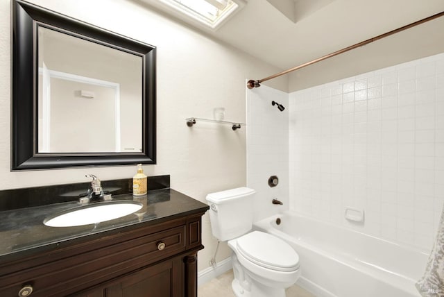 full bathroom featuring vanity, toilet, and tiled shower / bath combo