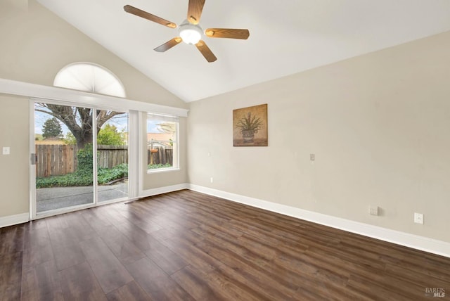 spare room featuring ceiling fan, dark hardwood / wood-style floors, and high vaulted ceiling