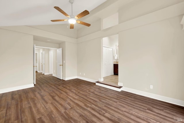 empty room featuring ceiling fan, high vaulted ceiling, and dark hardwood / wood-style flooring