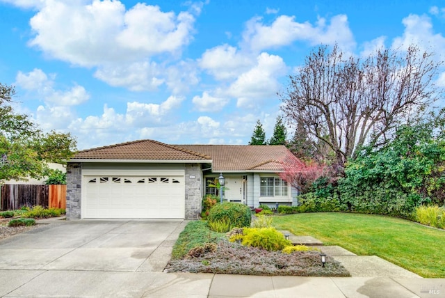 view of front facade featuring a garage and a front lawn