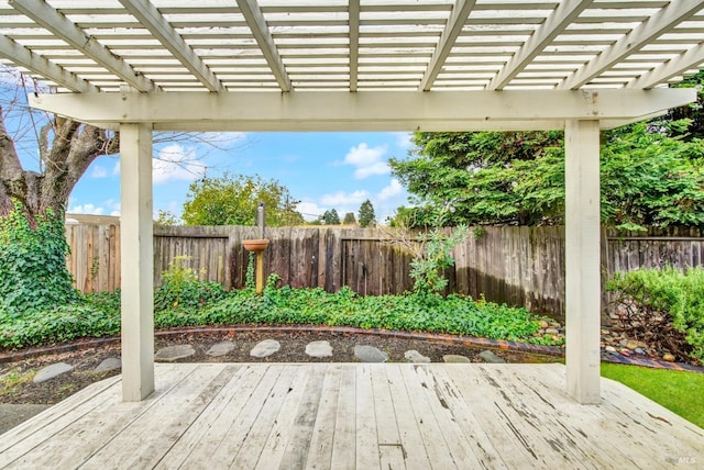 wooden deck featuring a pergola