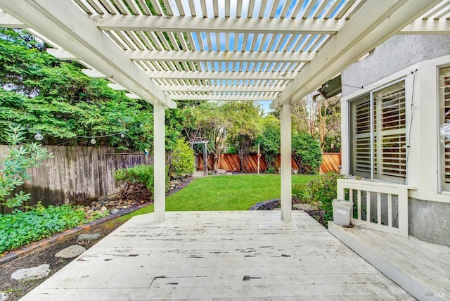 view of patio with a wooden deck and a pergola