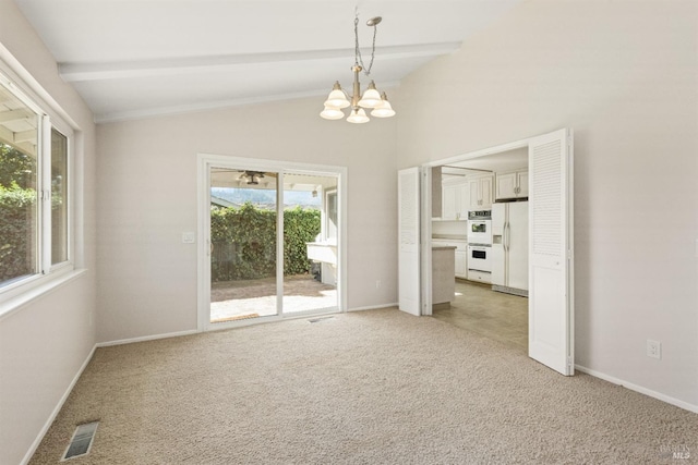 carpeted spare room featuring lofted ceiling with beams and an inviting chandelier