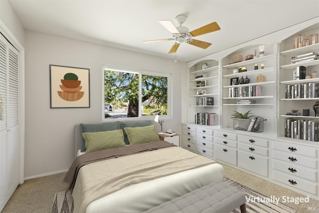 bedroom with carpet flooring, ceiling fan, and a closet