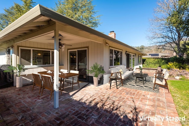 view of patio featuring an outdoor hangout area and ceiling fan