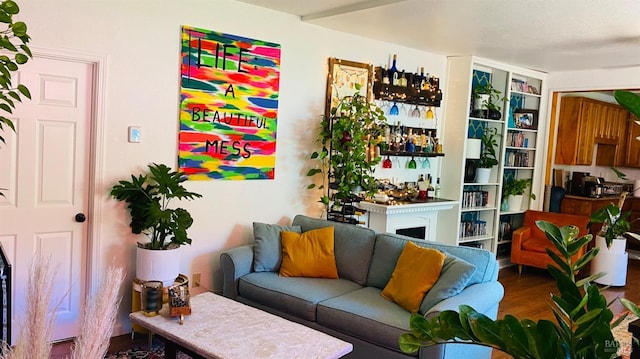 living area with hardwood / wood-style floors