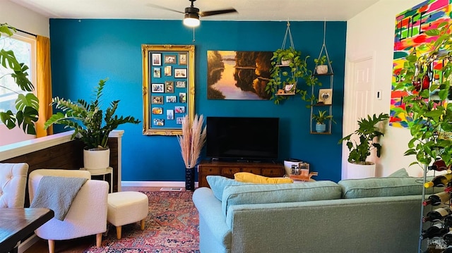 living room with ceiling fan