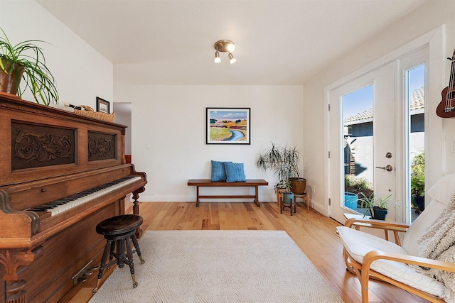 living area featuring light hardwood / wood-style floors