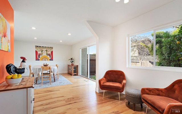 sitting room featuring light hardwood / wood-style flooring