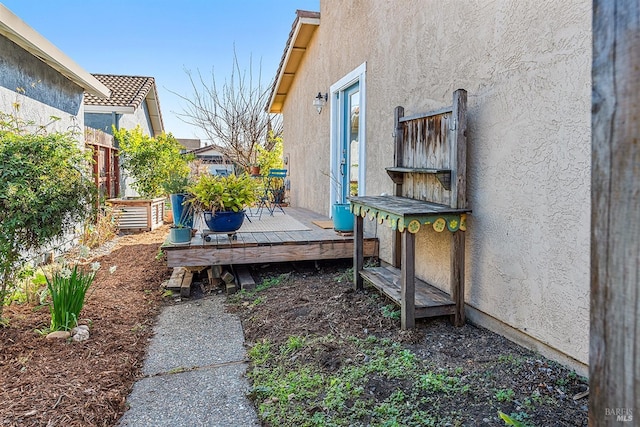 view of yard with a wooden deck