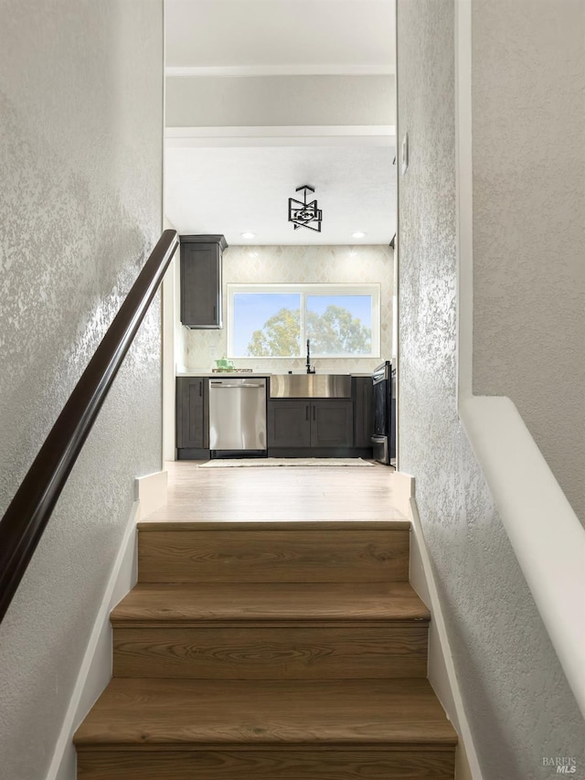 stairway with a textured wall
