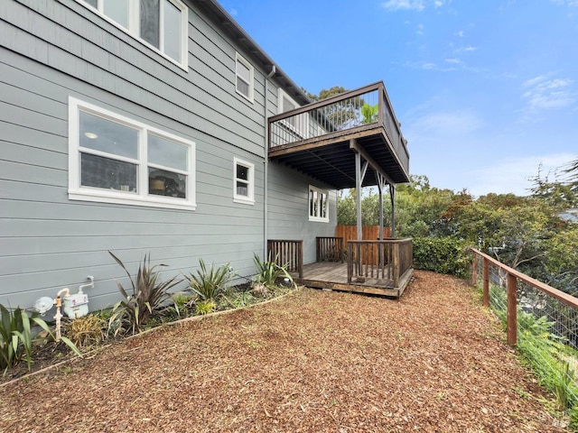 view of property exterior featuring a deck