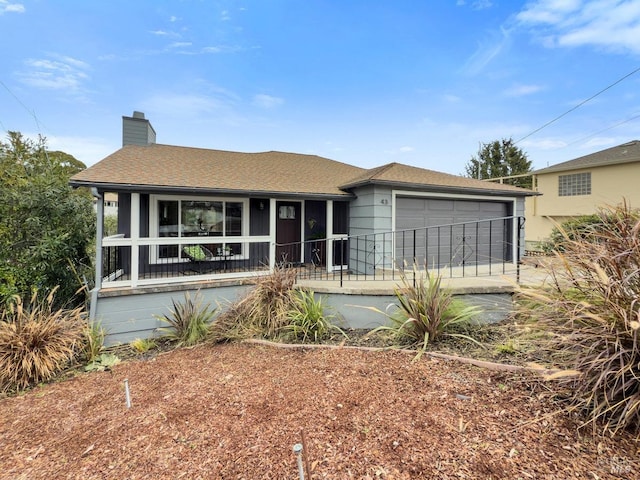 single story home with a garage