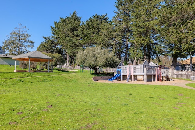 view of yard with a gazebo and a playground