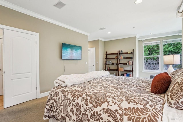 bedroom with ornamental molding and light carpet