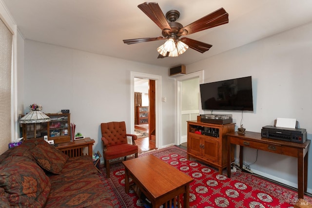 living room featuring ceiling fan