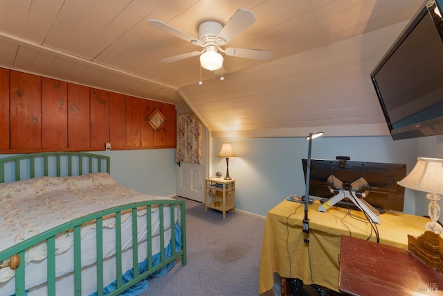 bedroom with lofted ceiling, wood ceiling, ceiling fan, and carpet flooring