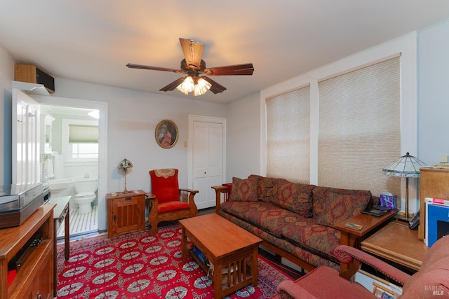 living room featuring ceiling fan