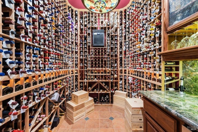 wine cellar with light tile patterned floors