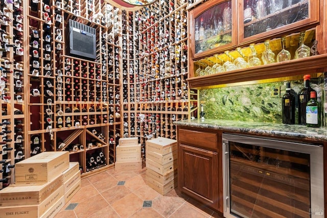 wine area featuring tile patterned flooring